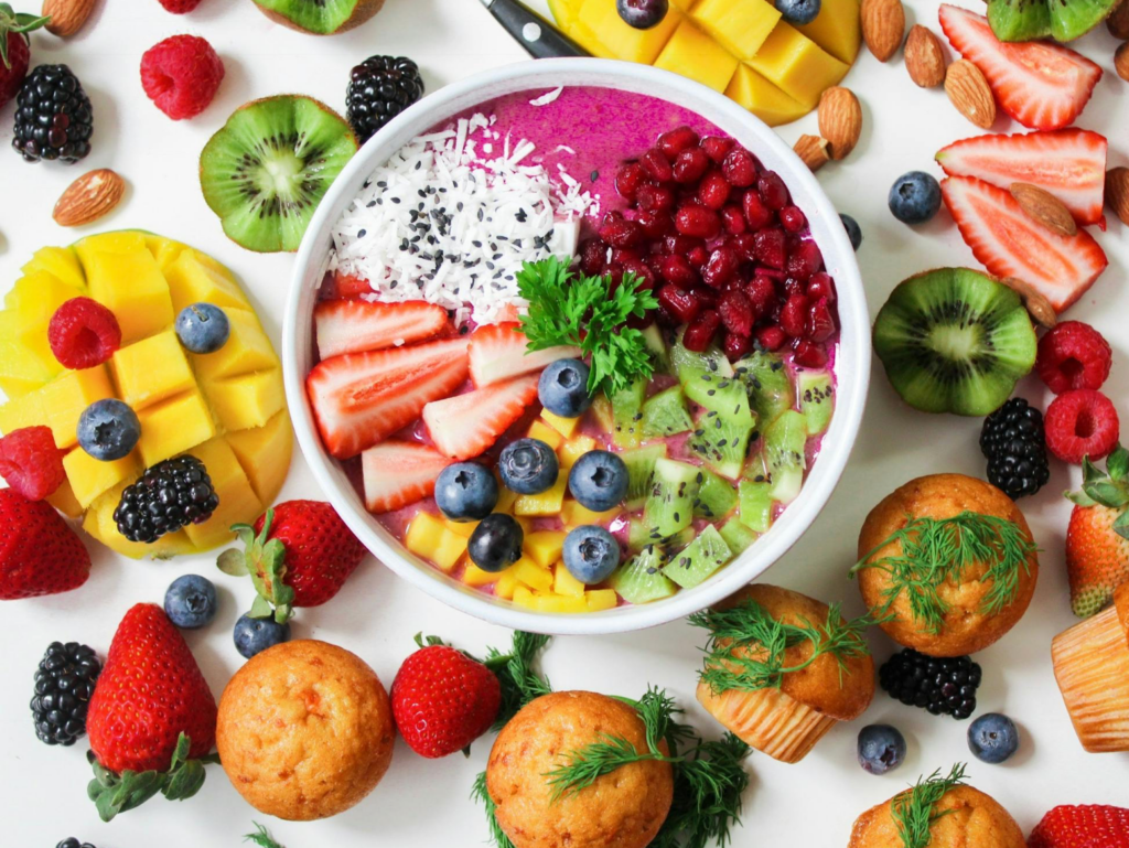 Assorted Sliced Fruits in White Ceramic Bowl